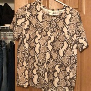 Snakeskin pocket t shirt.